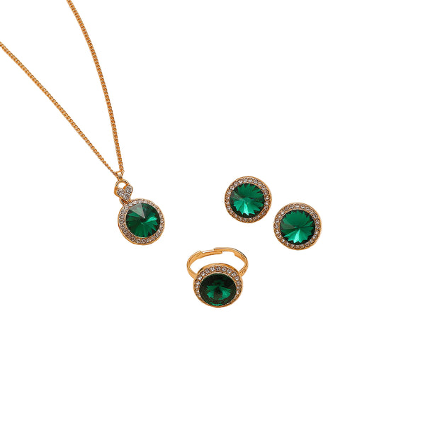 Jewelry set with green gemstones on a beige background
